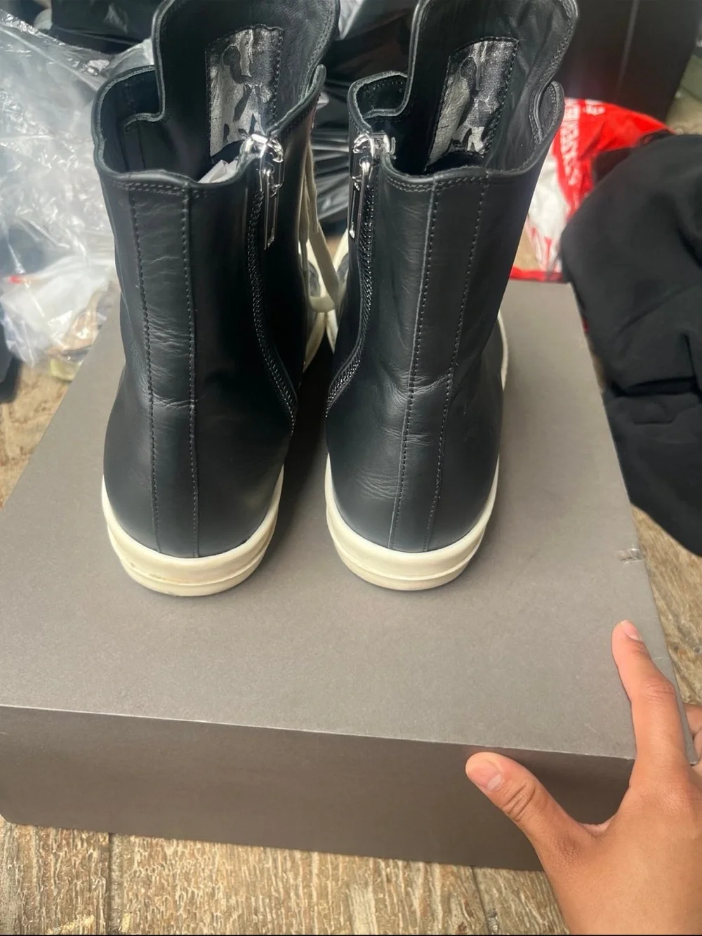 Rick Owens Black Leather High-Top Boat Sneakers with White Toe Caps